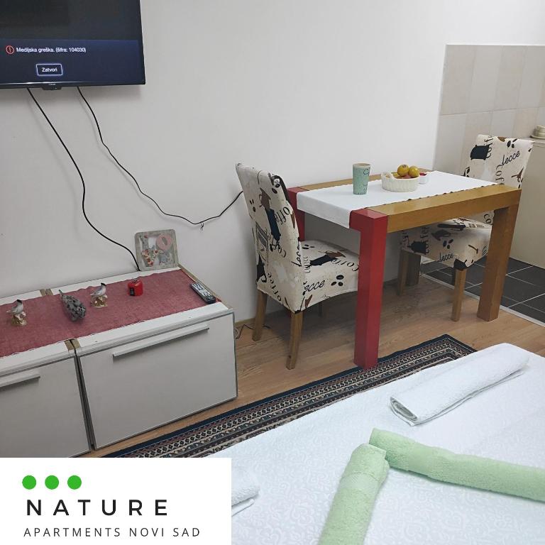 TV a/nebo společenská místnost v ubytování Just nature
