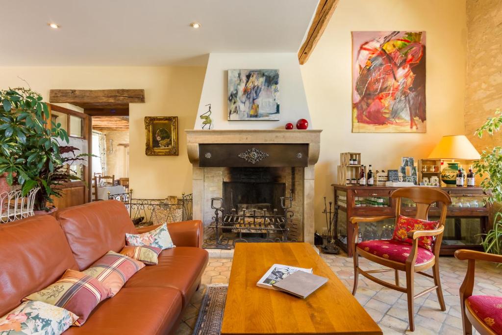 Posezení v ubytování Hôtel Le Clos