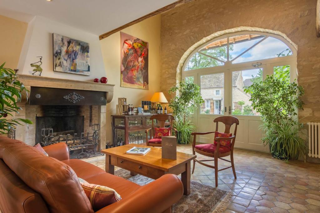 Posezení v ubytování Hôtel Le Clos