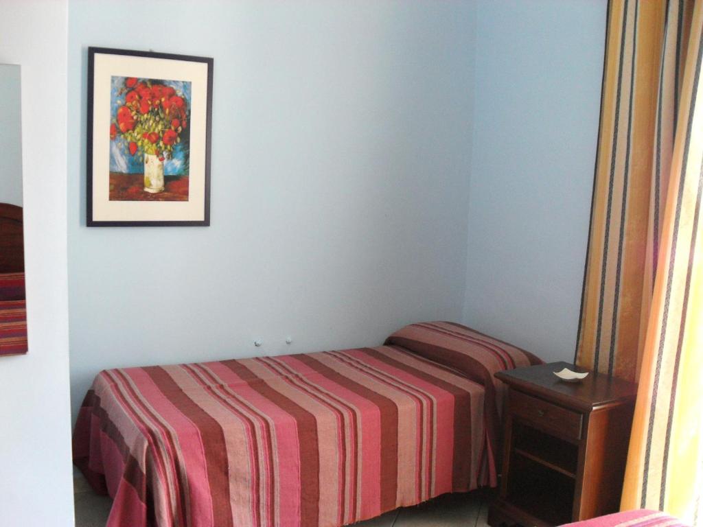 Posteľ alebo postele v izbe v ubytovaní Hotel Piro