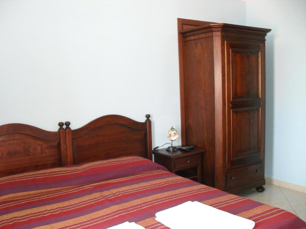 Posteľ alebo postele v izbe v ubytovaní Hotel Piro