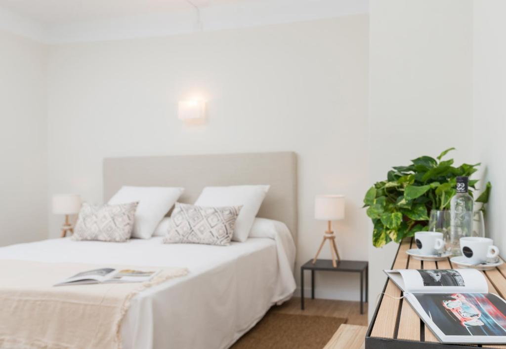 Cama ou camas em um quarto em Boutique Hotel Oriola