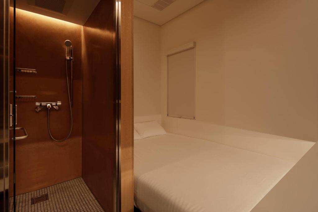 Postel nebo postele na pokoji v ubytování hotel min 大人専用