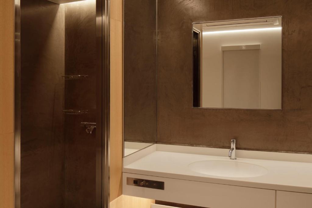 Koupelna v ubytování hotel min 大人専用