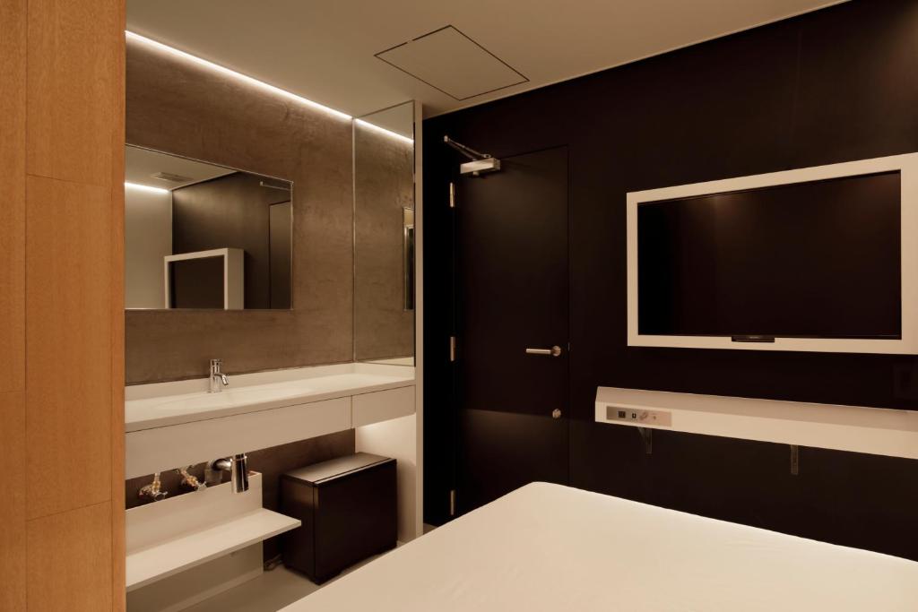 Koupelna v ubytování hotel min 大人専用