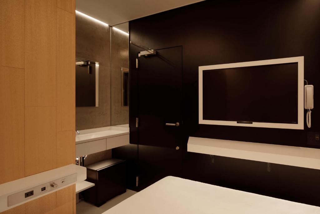 Postel nebo postele na pokoji v ubytování hotel min 大人専用