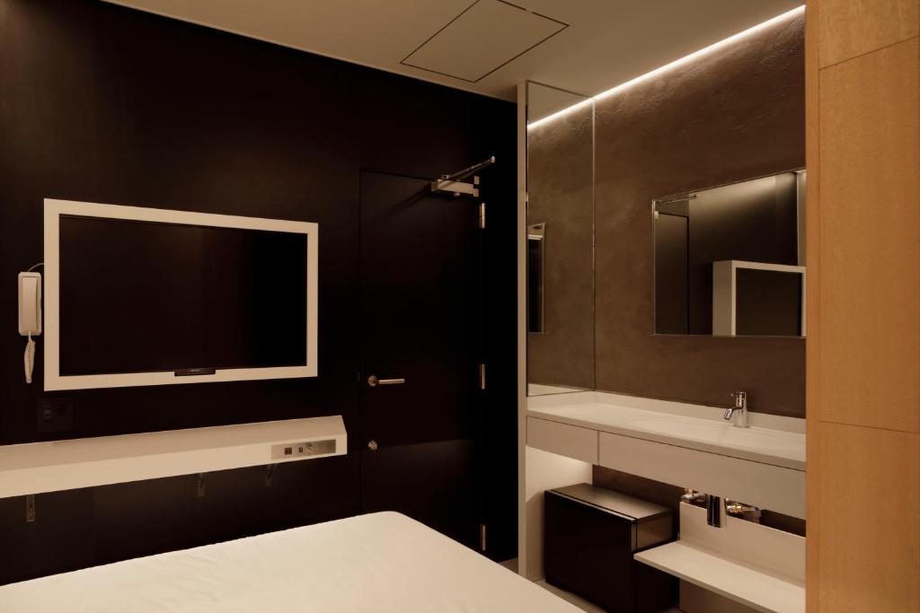 Koupelna v ubytování hotel min 大人専用