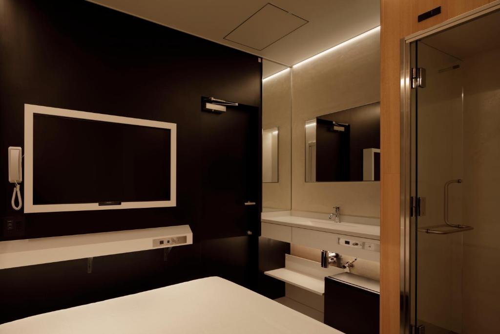 Koupelna v ubytování hotel min 大人専用