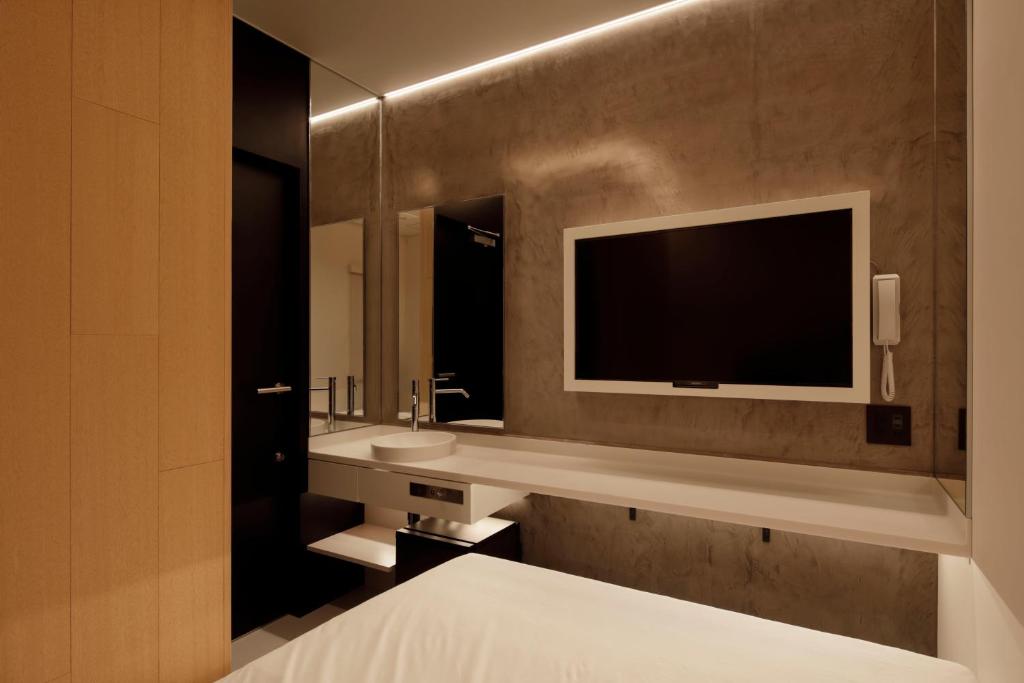 Postel nebo postele na pokoji v ubytování hotel min 大人専用