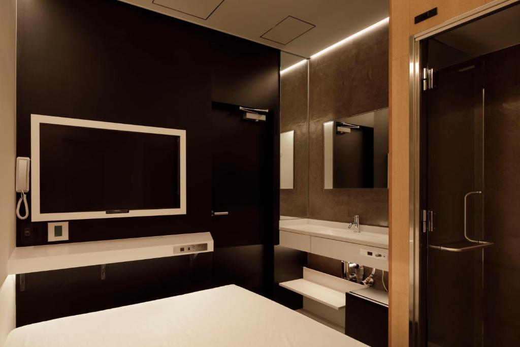 Koupelna v ubytování hotel min 大人専用