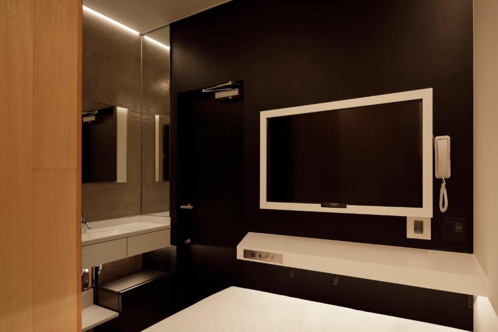 Postel nebo postele na pokoji v ubytování hotel min 大人専用