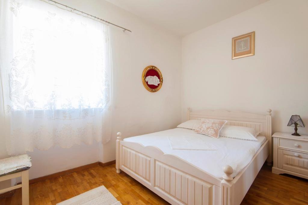 Łóżko lub łóżka w pokoju w obiekcie Resort Villa Moses