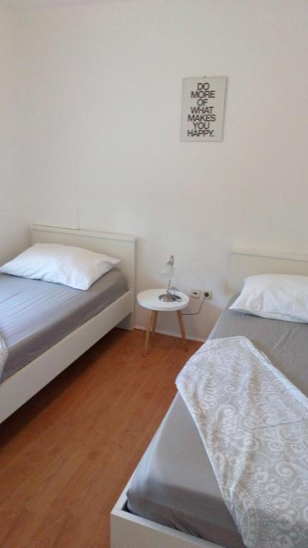 Posteľ alebo postele v izbe v ubytovaní Apartments Jurić - Zablaće