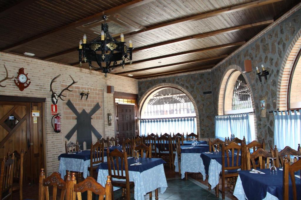 Un restaurante o sitio para comer en Posada de los Cónsules