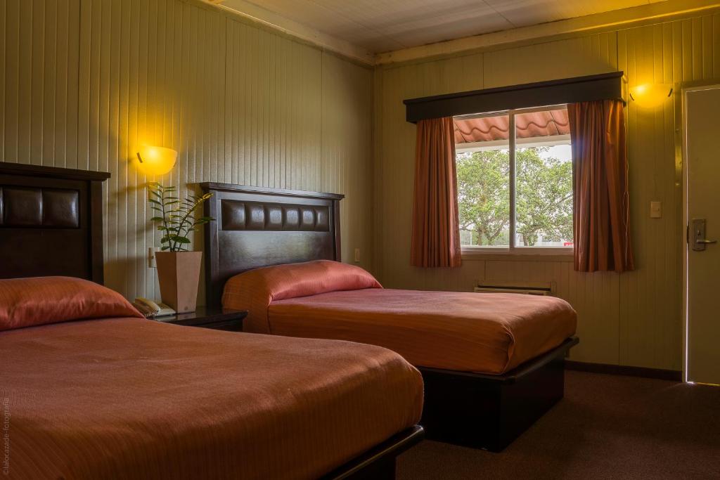 Postel nebo postele na pokoji v ubytování BONITTO INN® Tampico Altamira