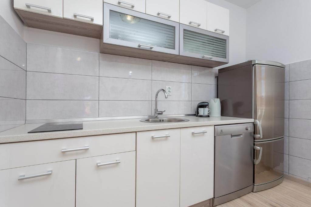 Kuchyňa alebo kuchynka v ubytovaní Apartment Božo