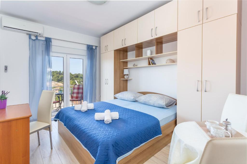 Posteľ alebo postele v izbe v ubytovaní Apartment Božo