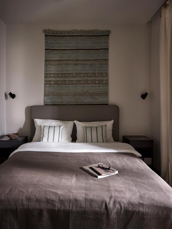 Postel nebo postele na pokoji v ubytování Apartamenty DECK Jurata