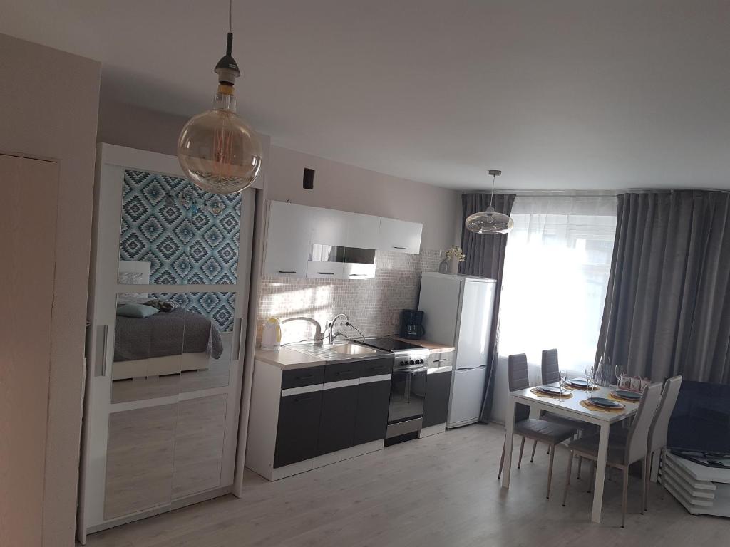 Postel nebo postele na pokoji v ubytování Vanilla Sky Apartments
