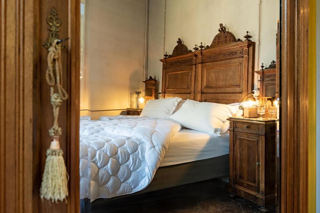 Postel nebo postele na pokoji v ubytování B&B Villa Rosalinda