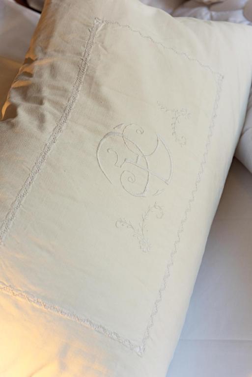 Postel nebo postele na pokoji v ubytování B&B Villa Rosalinda