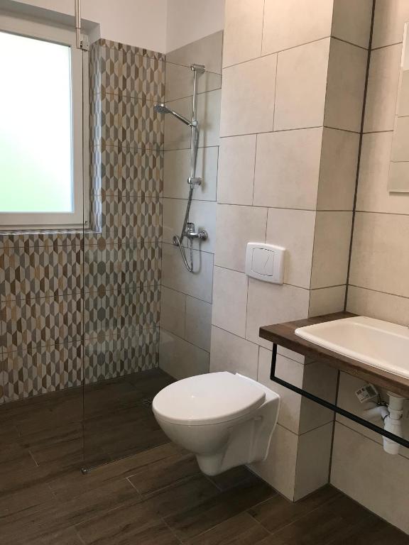 Kúpeľňa v ubytovaní Domki nad Brzegiem