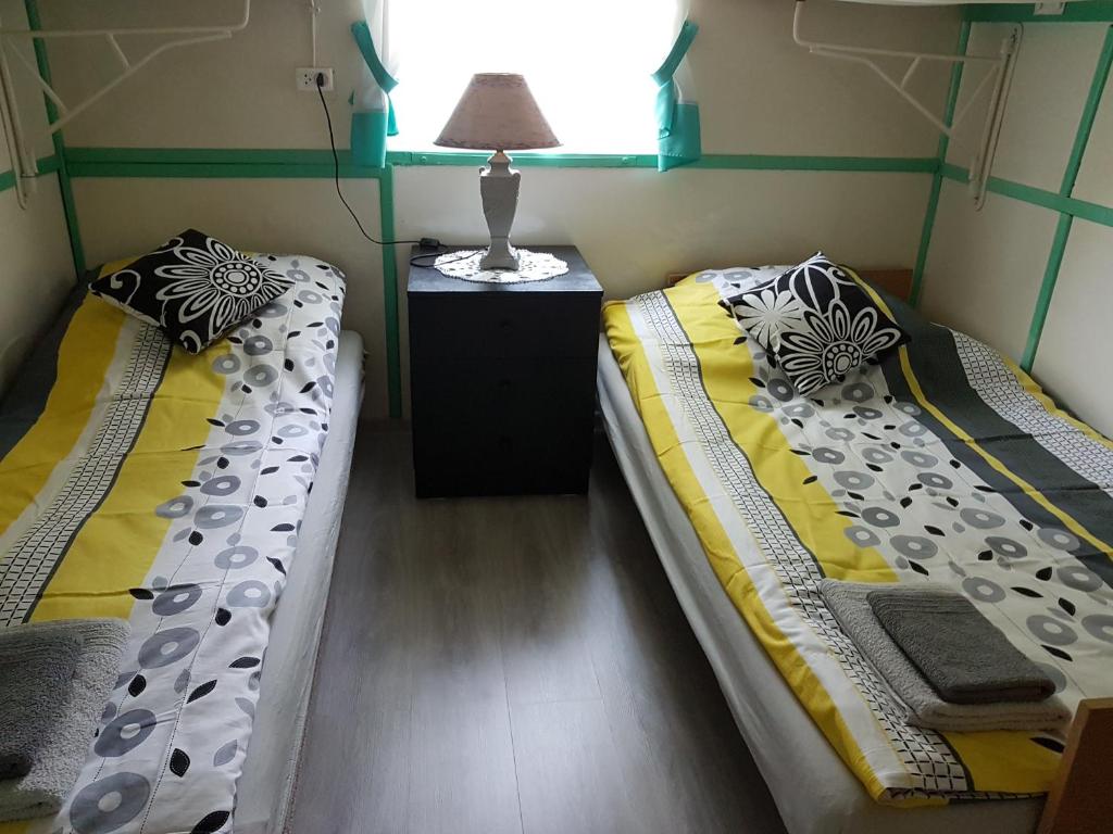 Postel nebo postele na pokoji v ubytování Leszkowo