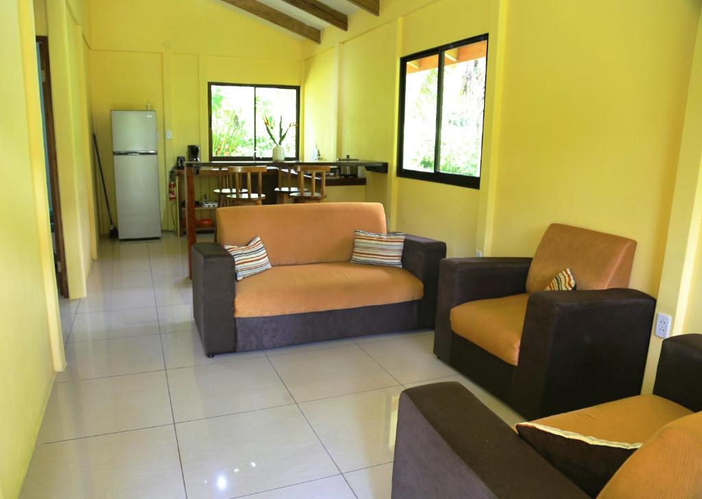 Posezení v ubytování Hotel & Cabinas Nadine
