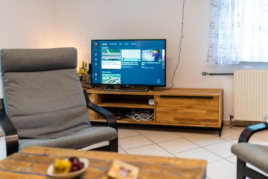 TV a/nebo společenská místnost v ubytování Ferienhaus im Grünen
