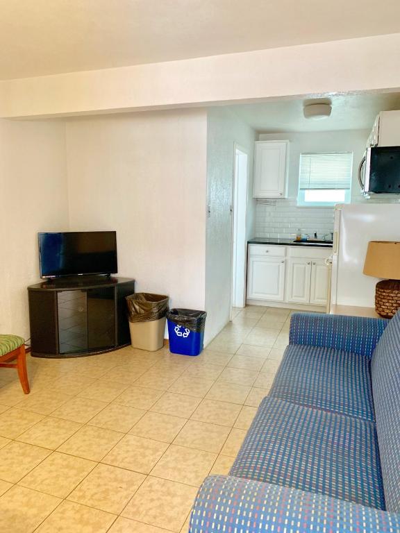 Kuchyň nebo kuchyňský kout v ubytování White Caps Motel