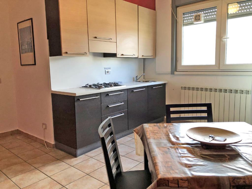 Kuchyň nebo kuchyňský kout v ubytování La Chiocciola Guesthouse Briantea