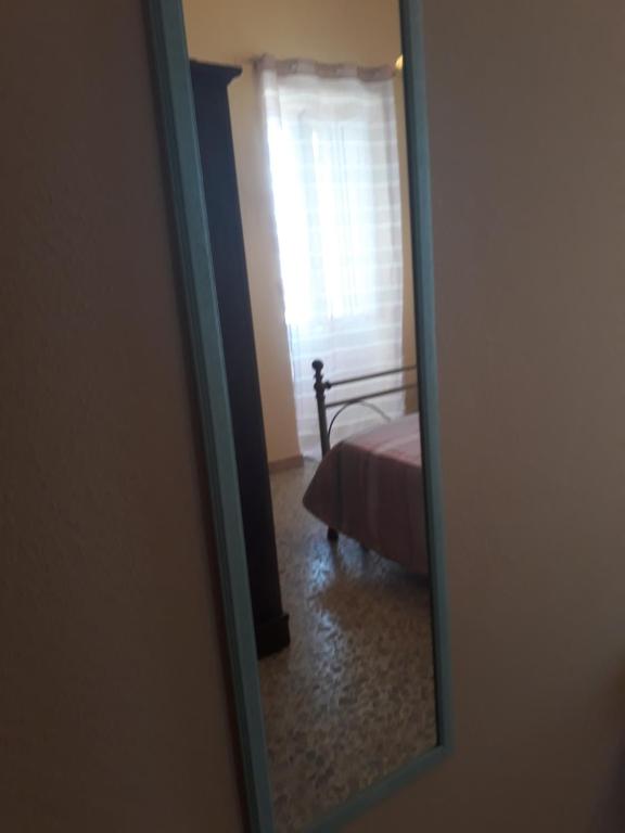 Posteľ alebo postele v izbe v ubytovaní L'Antico Faro