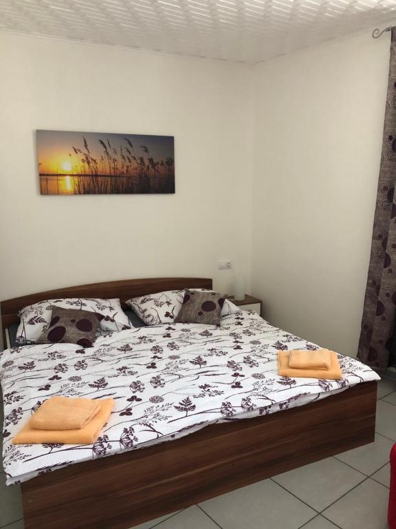 Postel nebo postele na pokoji v ubytování Alegria Natur Apartments