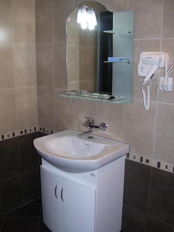 Koupelna v ubytování Kestenite Family Hotel