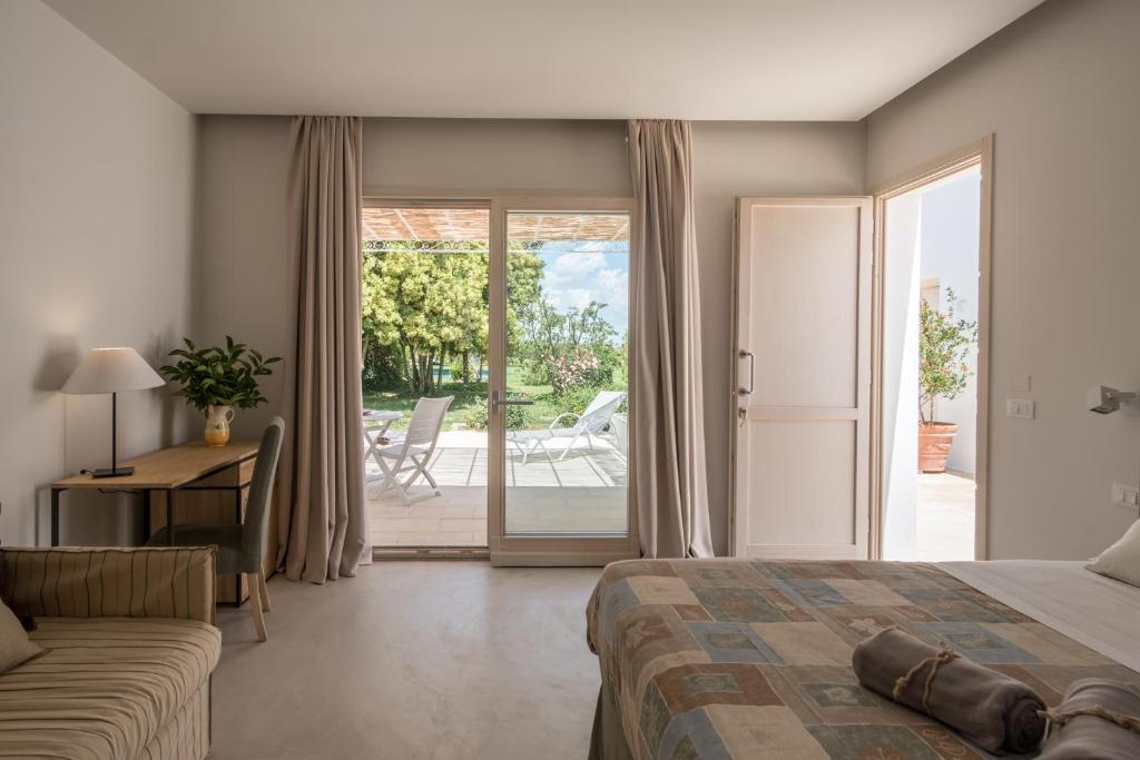 Postel nebo postele na pokoji v ubytování Tenuta DonnAnna Agriturismo&Glamping