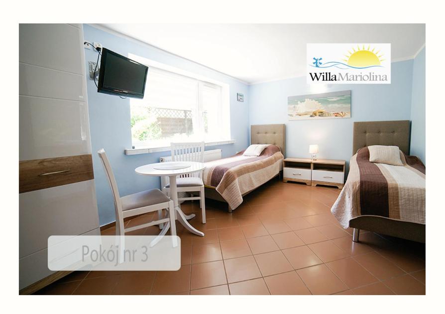 Postel nebo postele na pokoji v ubytování Willa Mariolina