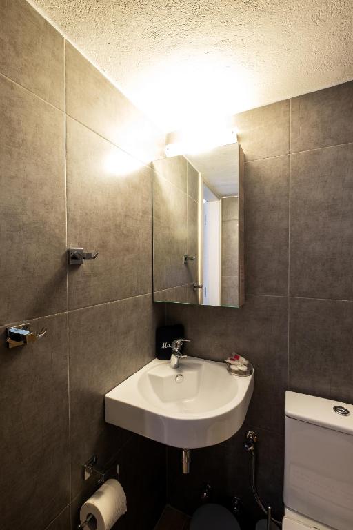 Koupelna v ubytování Dilion Hotel