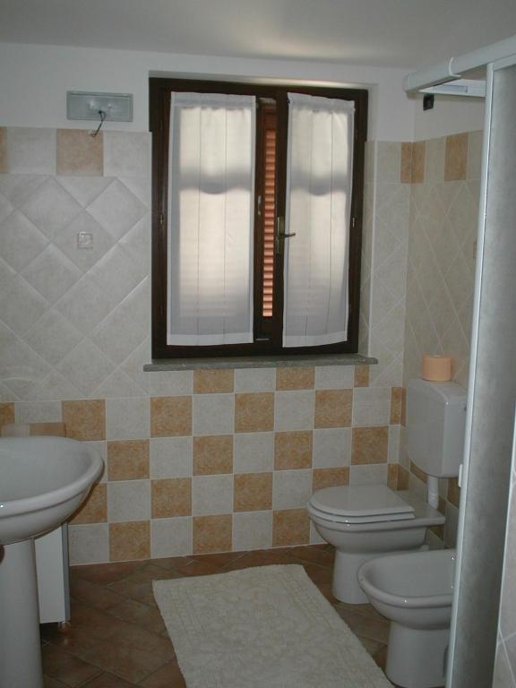 Koupelna v ubytování Agriturismo I Grappoli