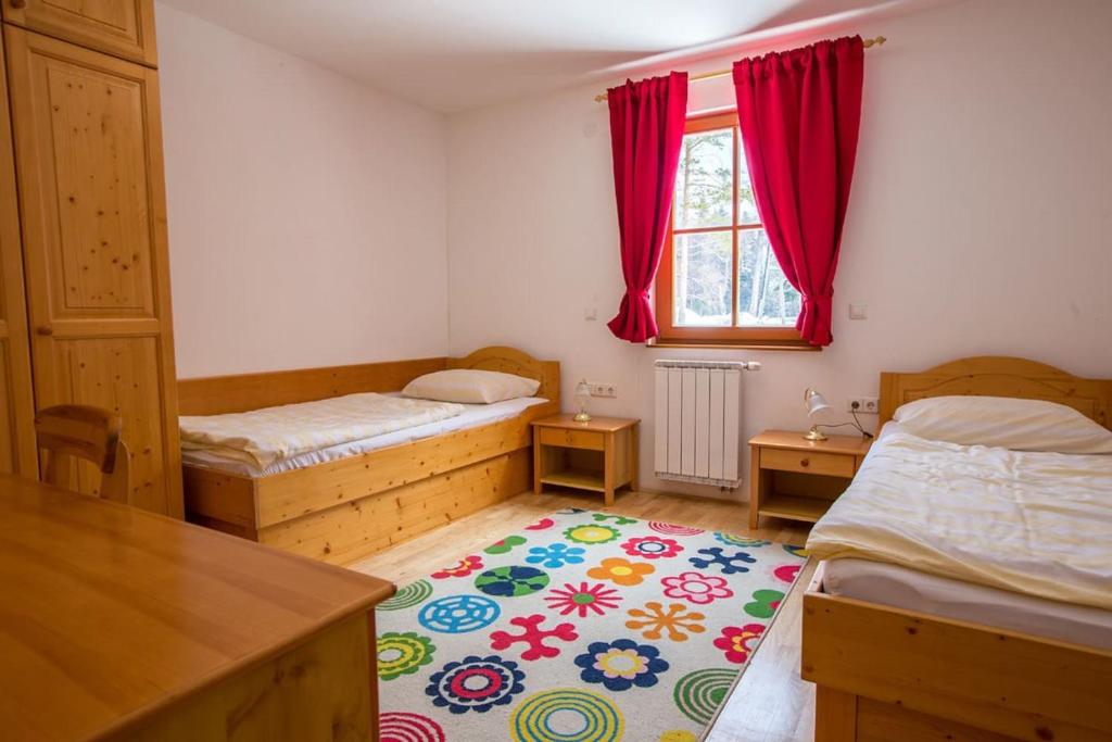 Postel nebo postele na pokoji v ubytování Bolfenk lodge apartment