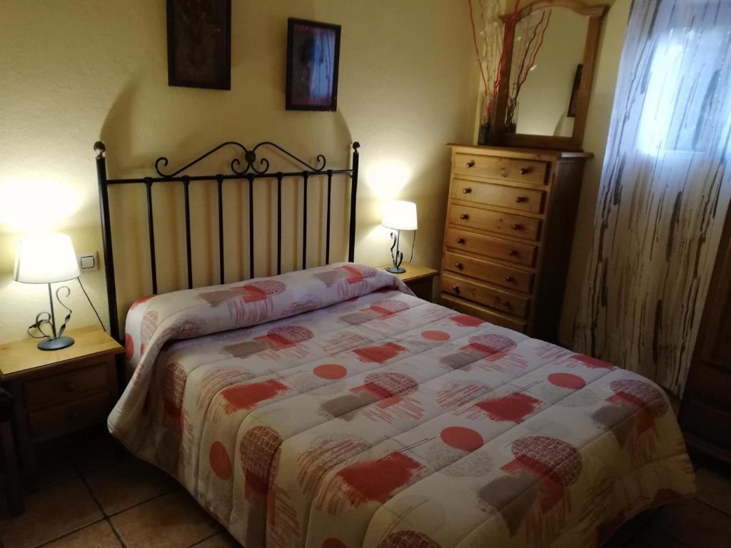 Postel nebo postele na pokoji v ubytování Alojamientos Rurales Vado Ancho La Encina