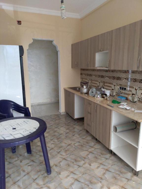 Kuchyň nebo kuchyňský kout v ubytování Guest House Kakha