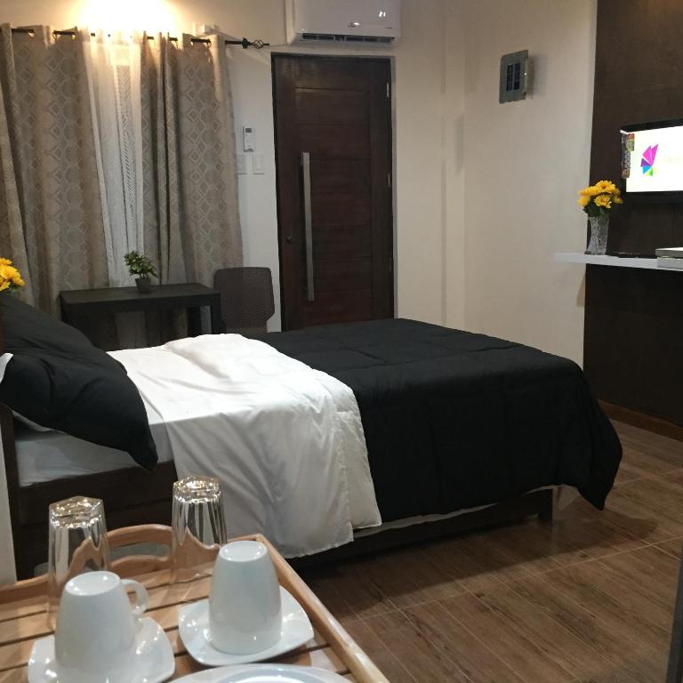 TV a/nebo společenská místnost v ubytování MIRASOL Residences