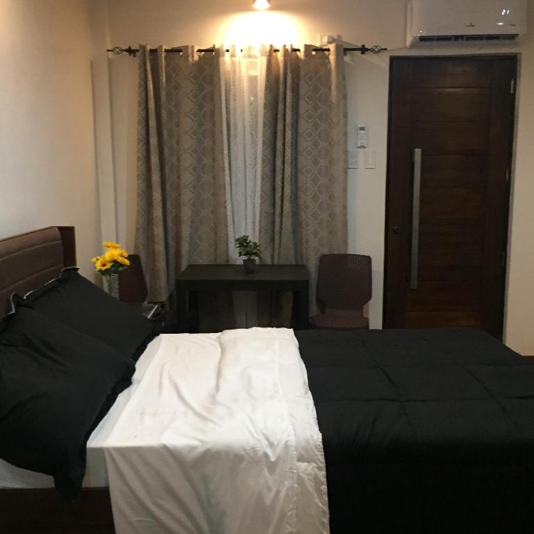 Postel nebo postele na pokoji v ubytování MIRASOL Residences