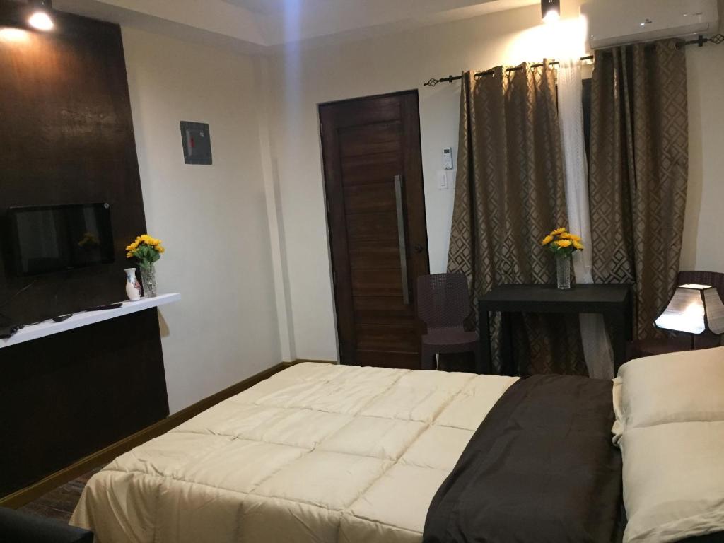 Postel nebo postele na pokoji v ubytování MIRASOL Residences