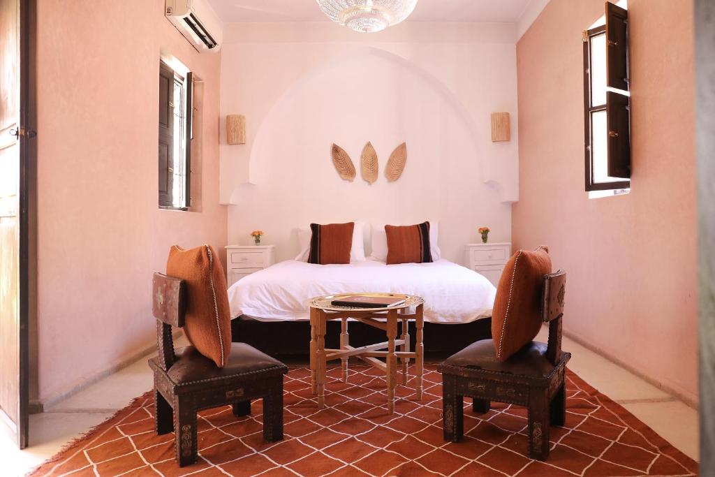 Letto o letti in una camera di Riad l'Oiseau du Paradis