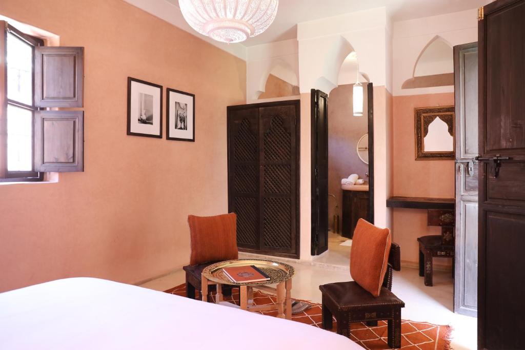 Letto o letti in una camera di Riad l'Oiseau du Paradis