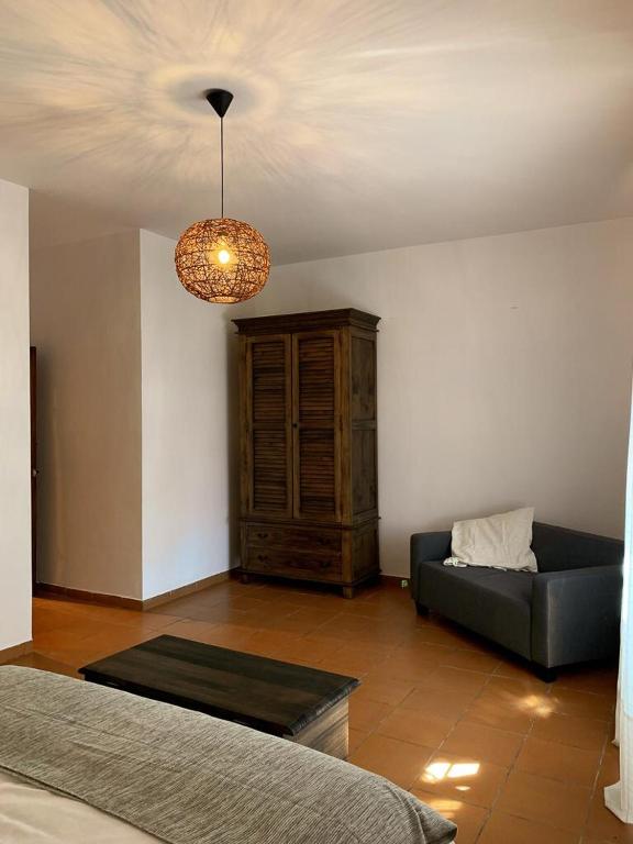 Postel nebo postele na pokoji v ubytování CASA RURAL CORTIJO LAS HUERTAS
