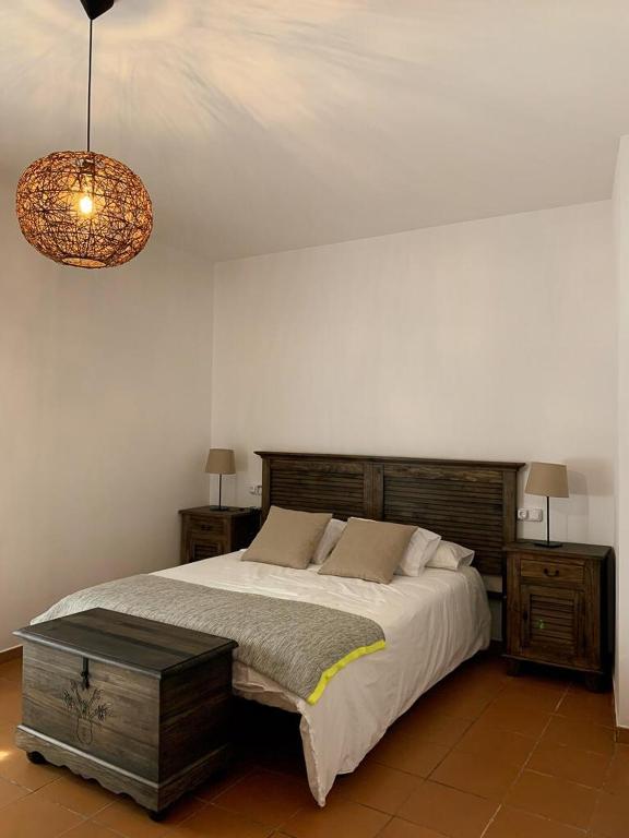 Postel nebo postele na pokoji v ubytování CASA RURAL CORTIJO LAS HUERTAS