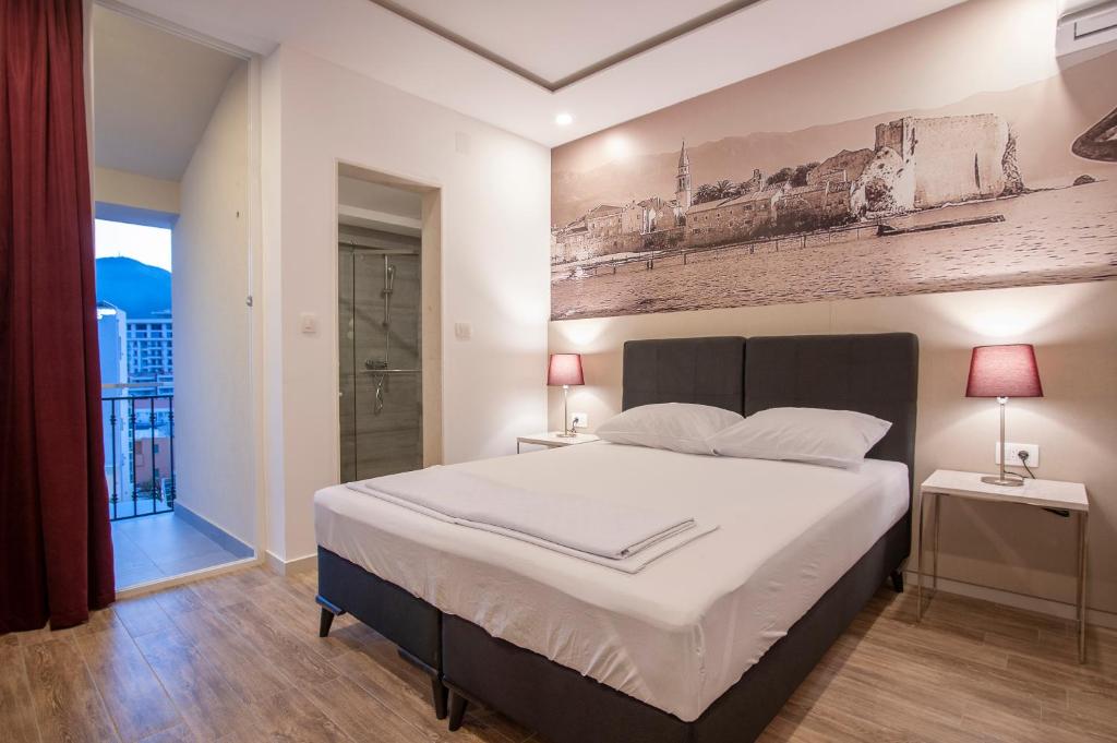 Postel nebo postele na pokoji v ubytování Casa Mia
