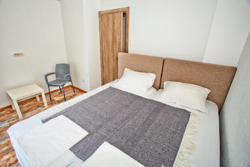 Postel nebo postele na pokoji v ubytování Beachfront Villa Nautica